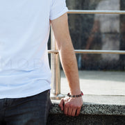Male wearing TripeProt 10mm bracelet, LFS style.